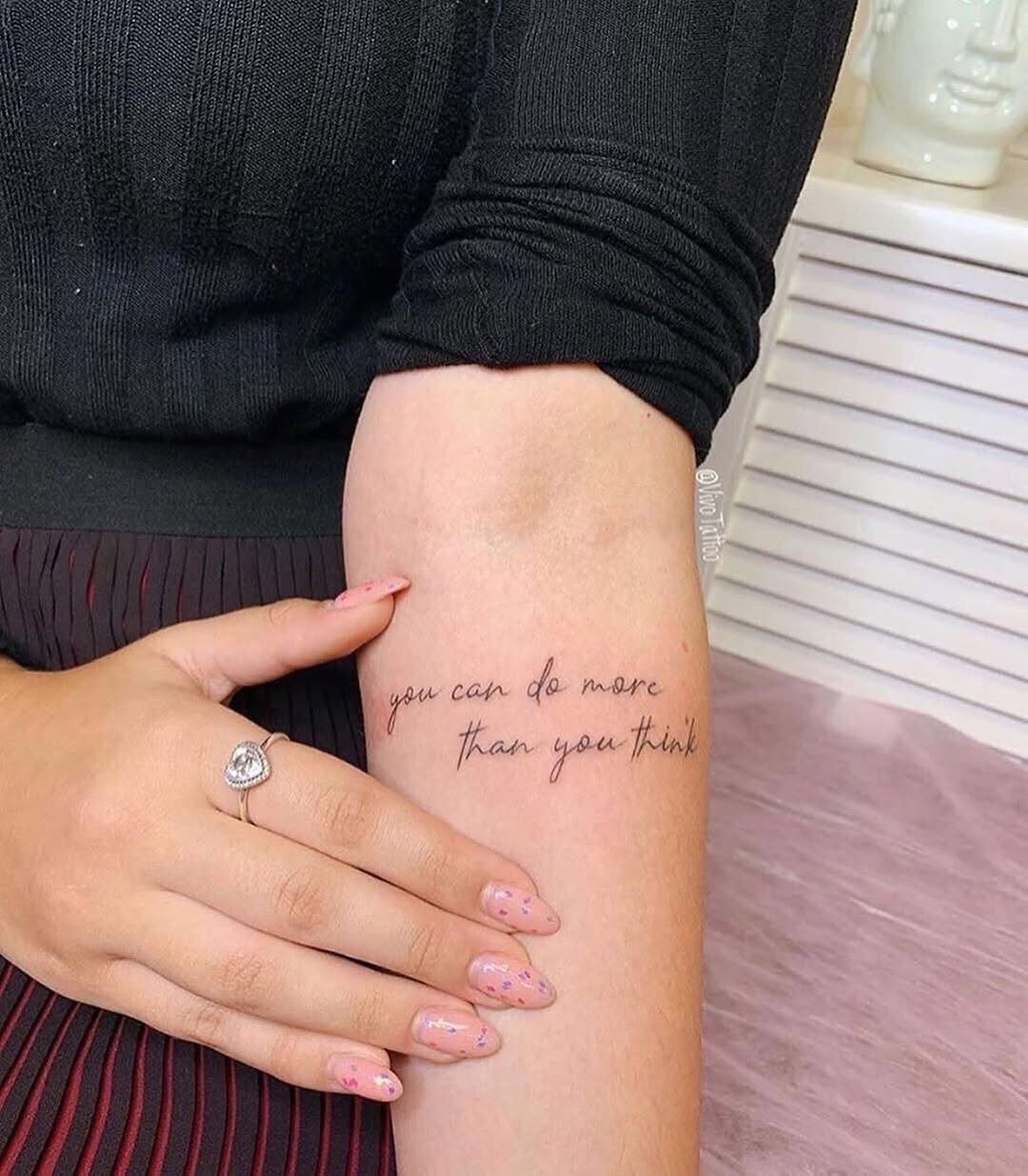 Elegant Quote Tattoo for Daily Motivation
