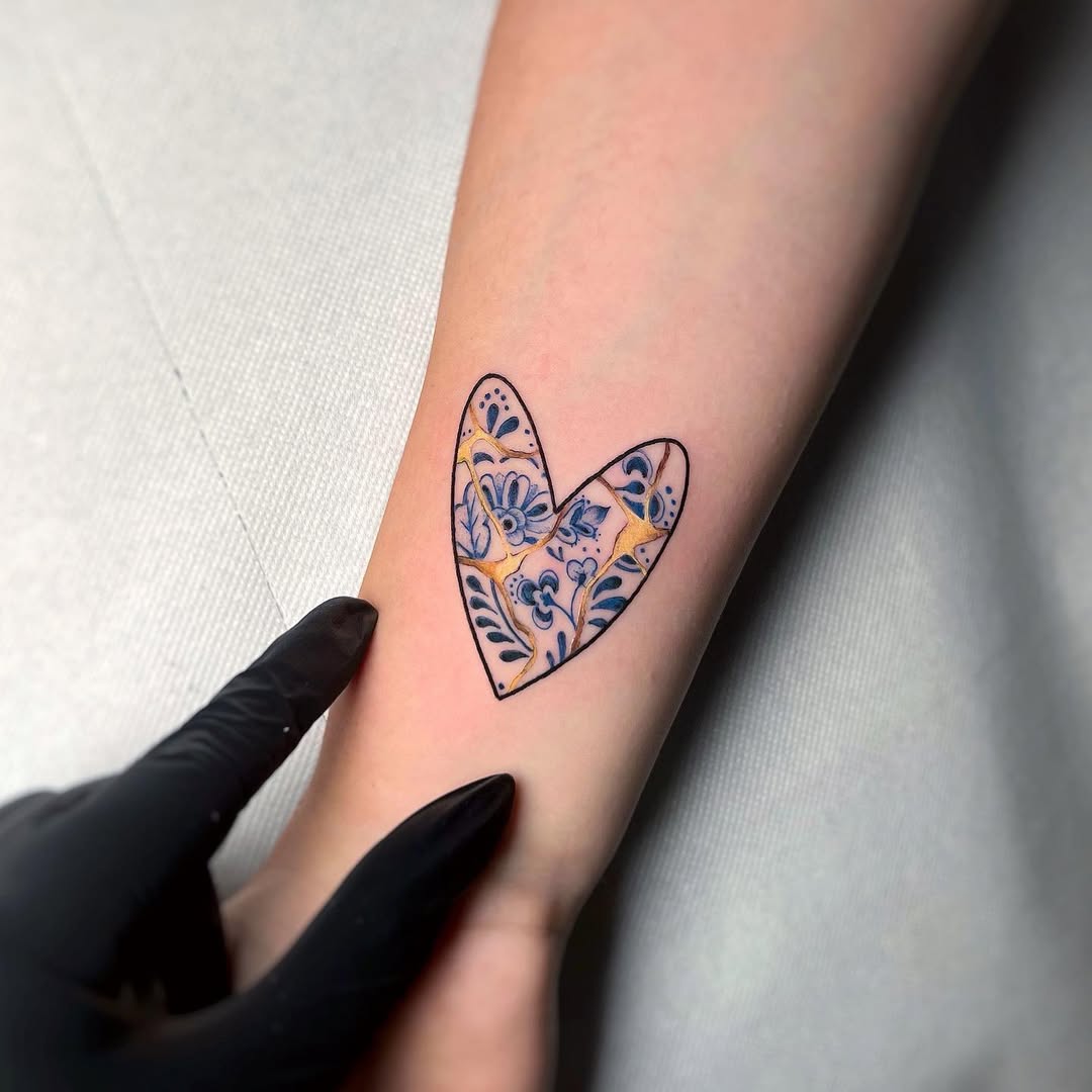 Intricate heart design with kintsugi elements