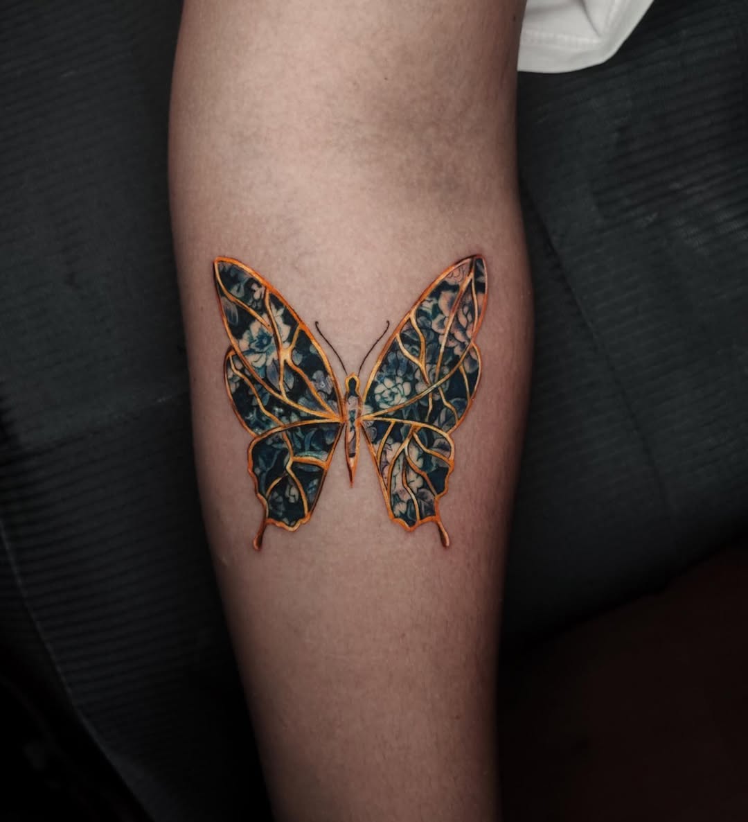 Artfully Broken: The Butterfly Tattoo Elegance
