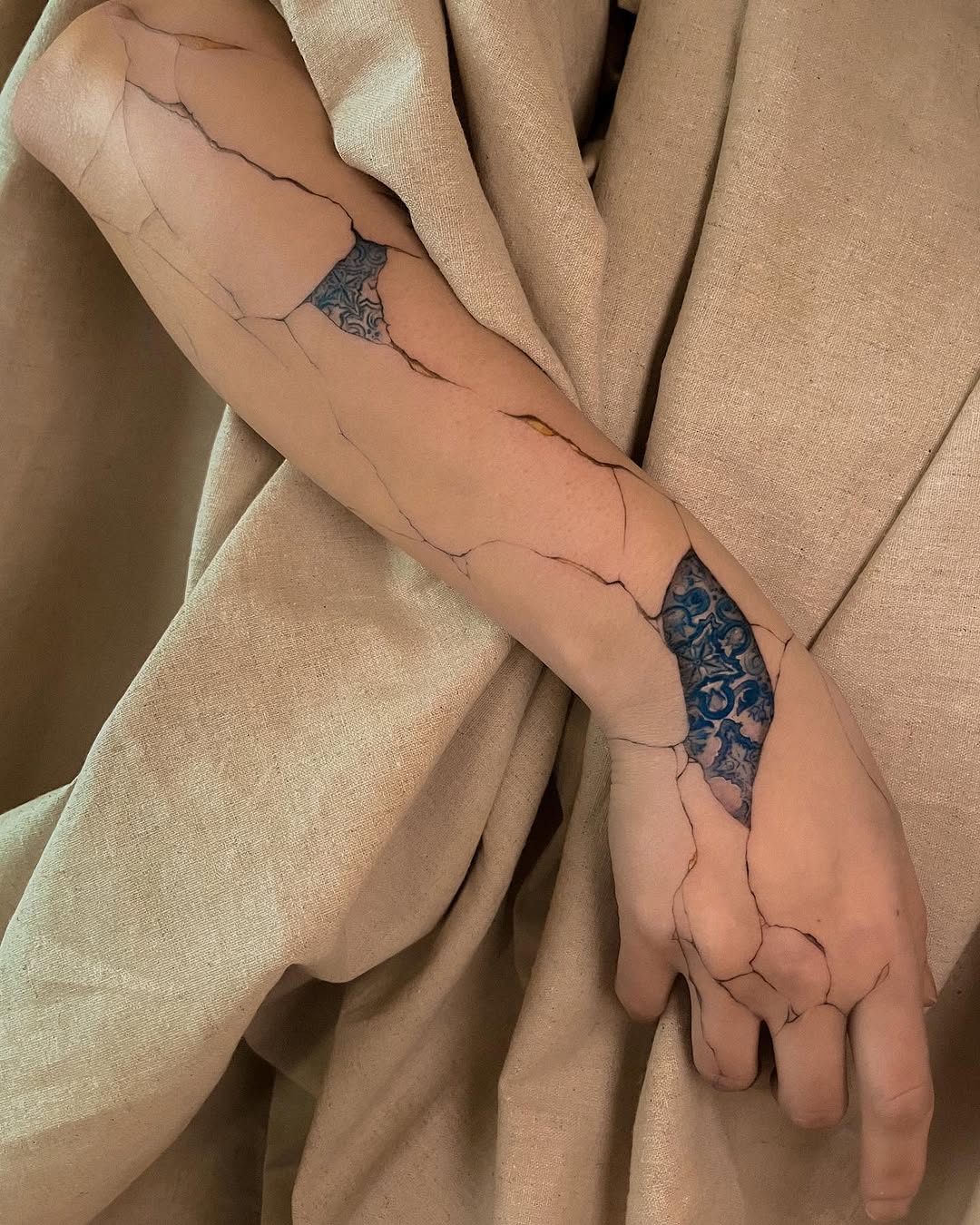 Elegant kintsugi tattoo showcasing healing artistry