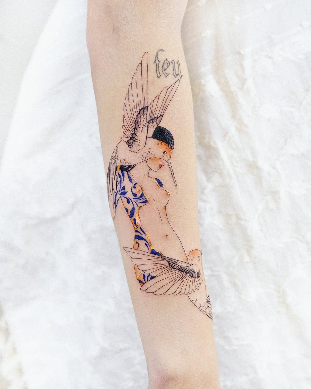 Elegant Kintsugi-Inspired Bird and Body Tattoo