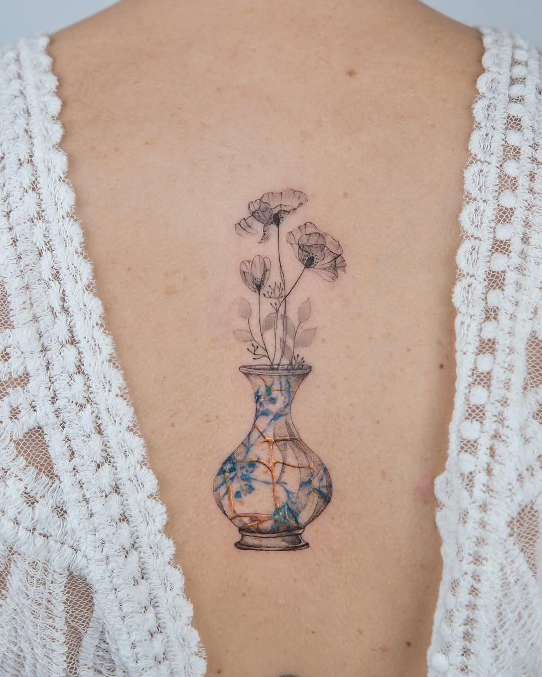Elegant tattoo blending beauty and imperfection