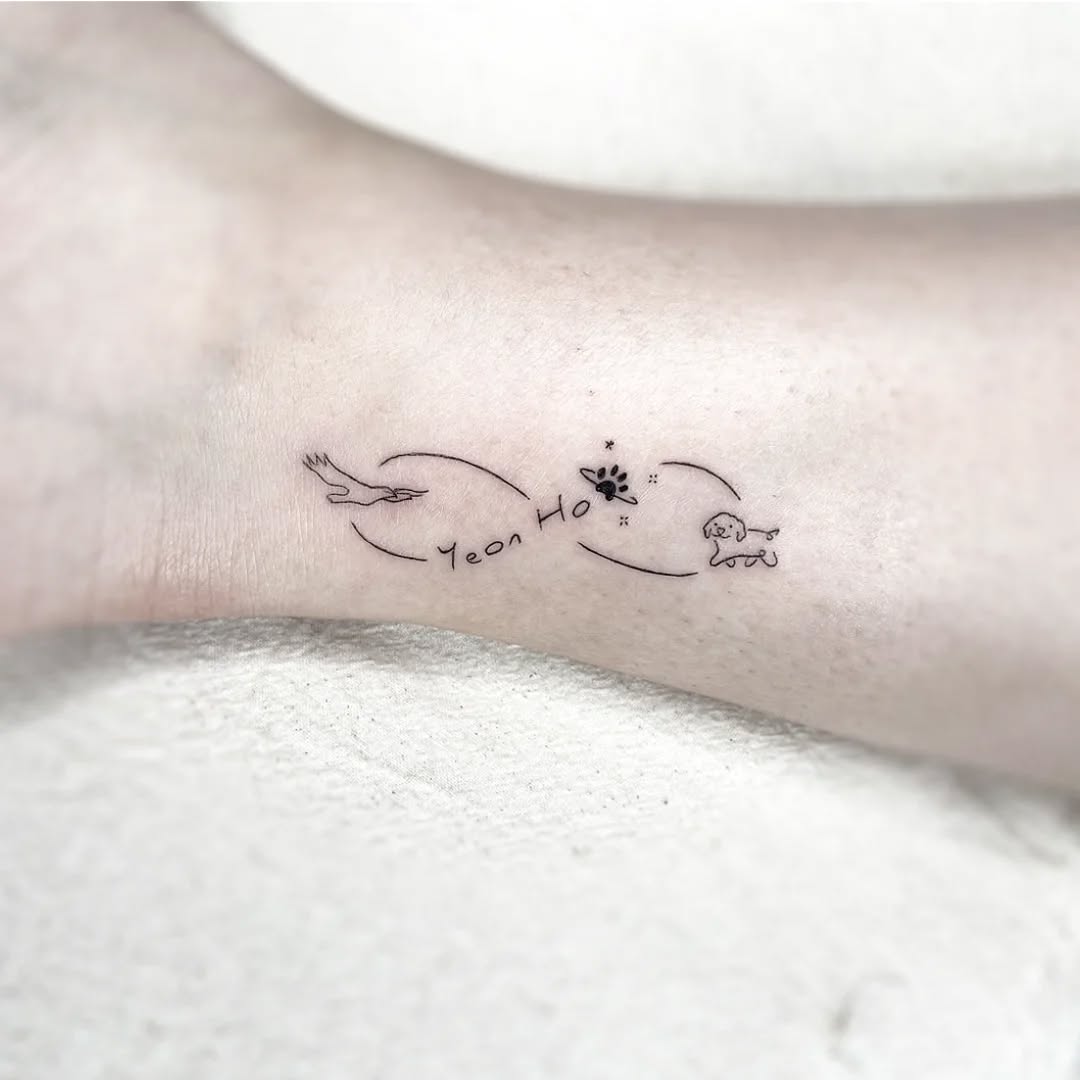 Symbolic infinity tattoo with animal motifs