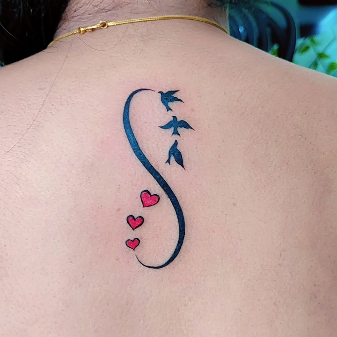 Elegant infinity design with birds and hearts