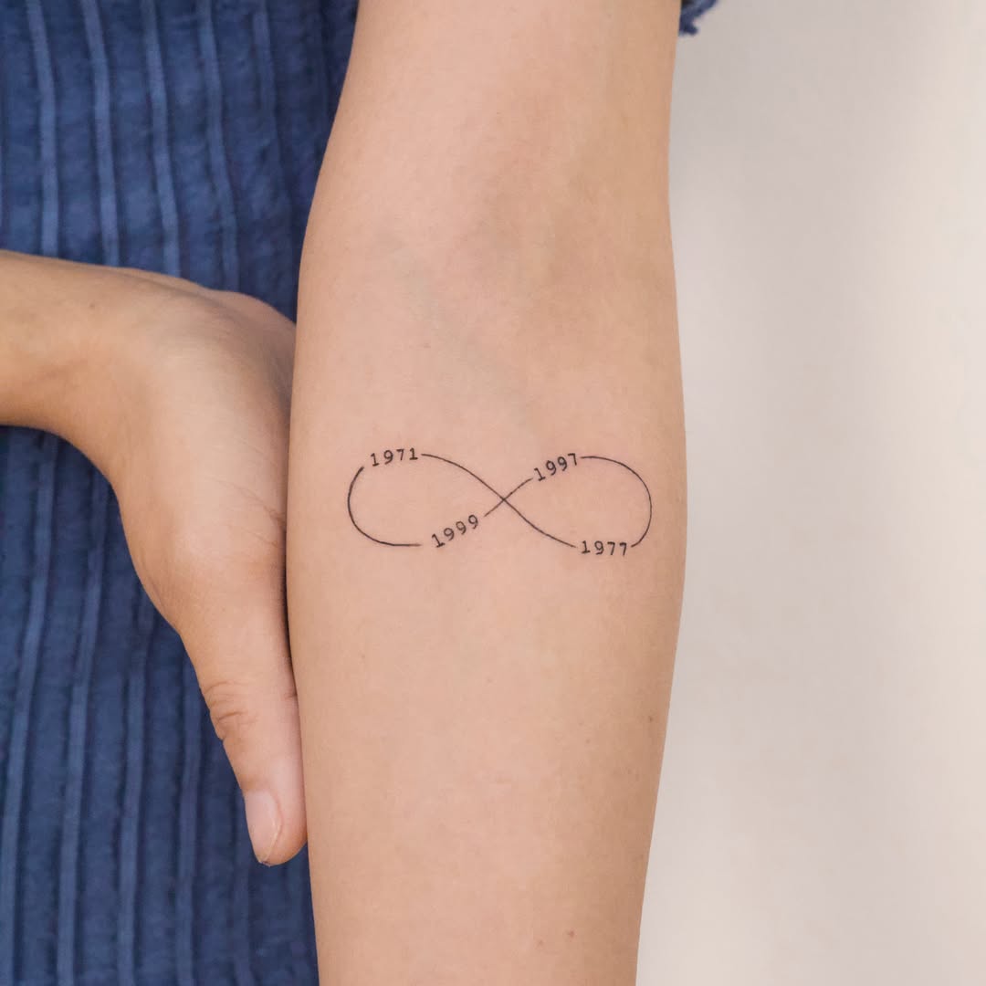 Personalized infinity tattoo with significant dates