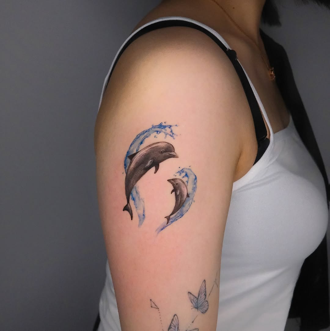 Playful dolphins in vibrant blue waves