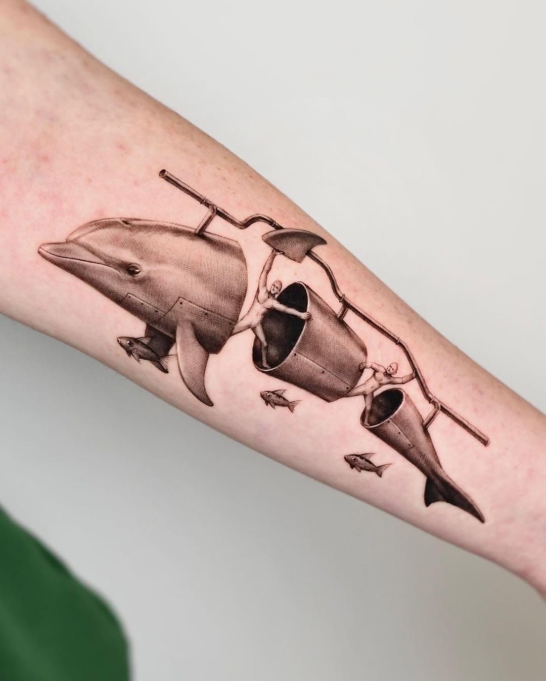 Realistic dolphin tattoo with creative elements