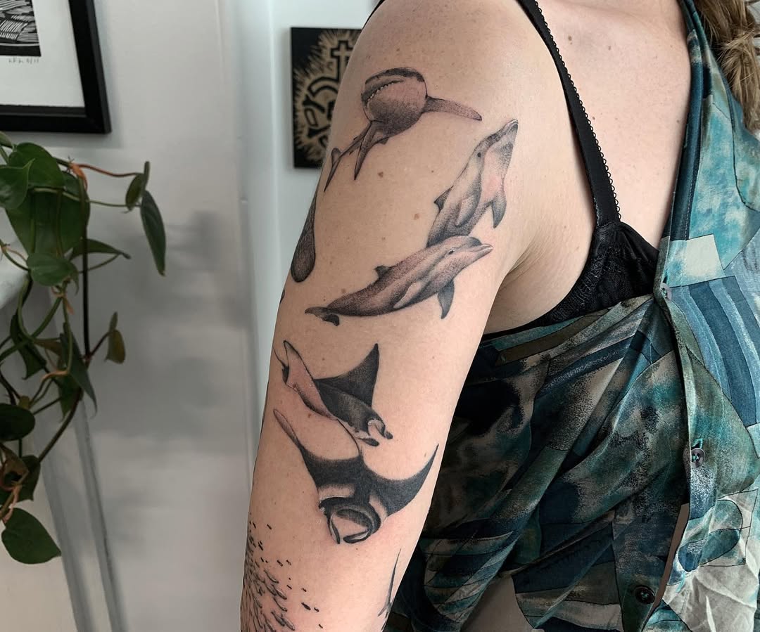 Artistic Representation of Dolphin Species Tattoos