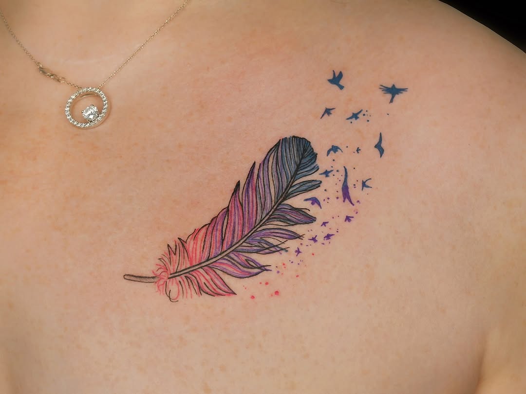 Elegant feather tattoo with playful bird motif