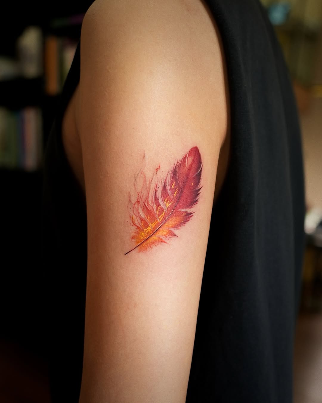 Stunning Vibrant Feather Tattoo Design