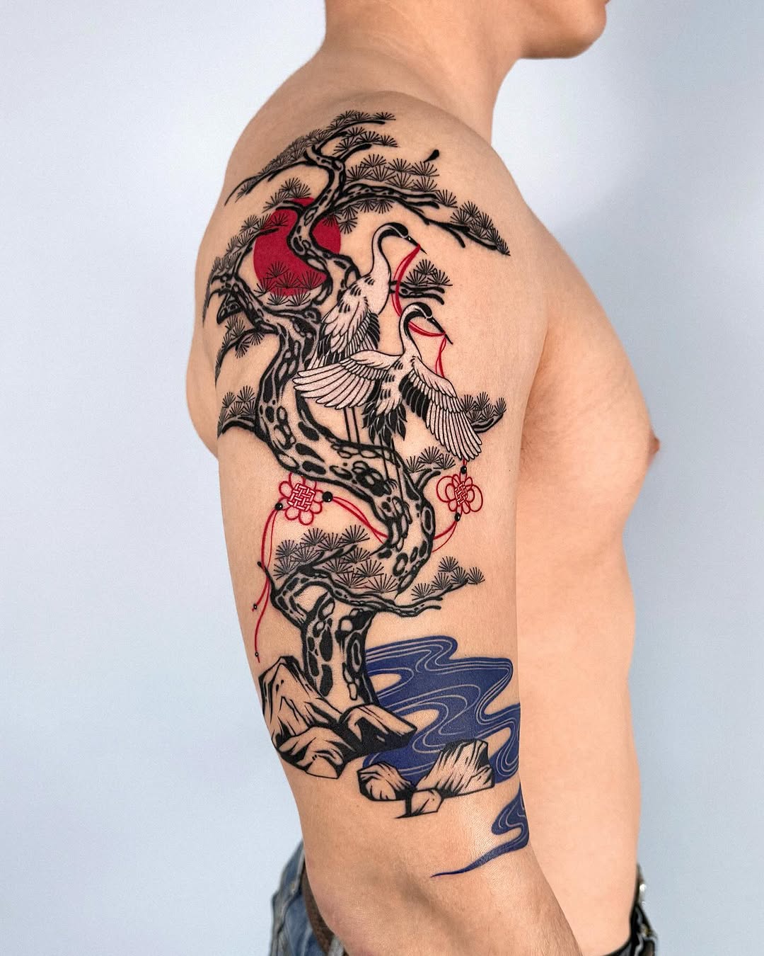 Stunning Crane and Pine Tree Tattoo Design