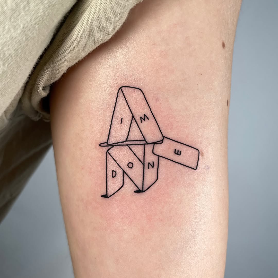 Minimalistic fine line tattoo with bold message