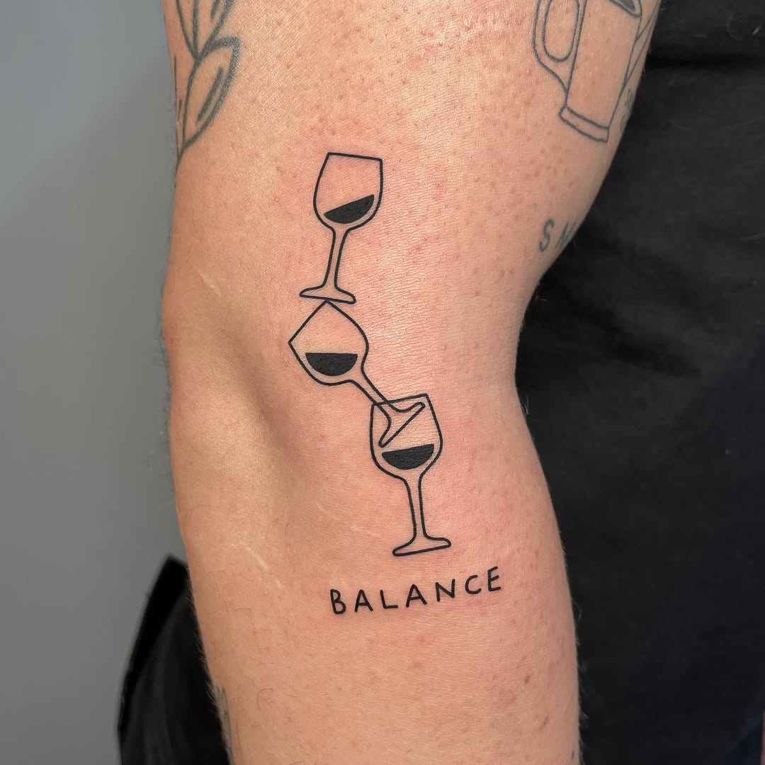 Minimalist tattoo representing balance and harmony