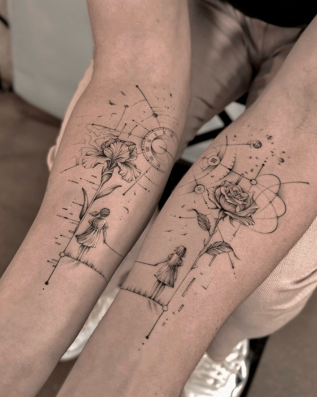 Elegant fine line floral tattoo design