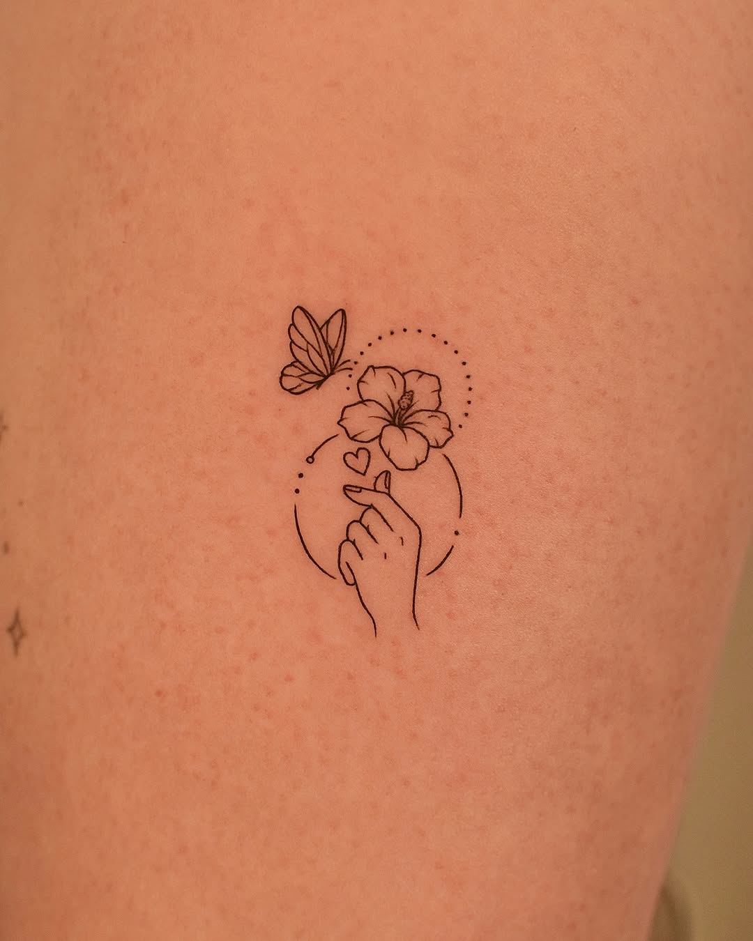 Delicate design featuring a hand and nature