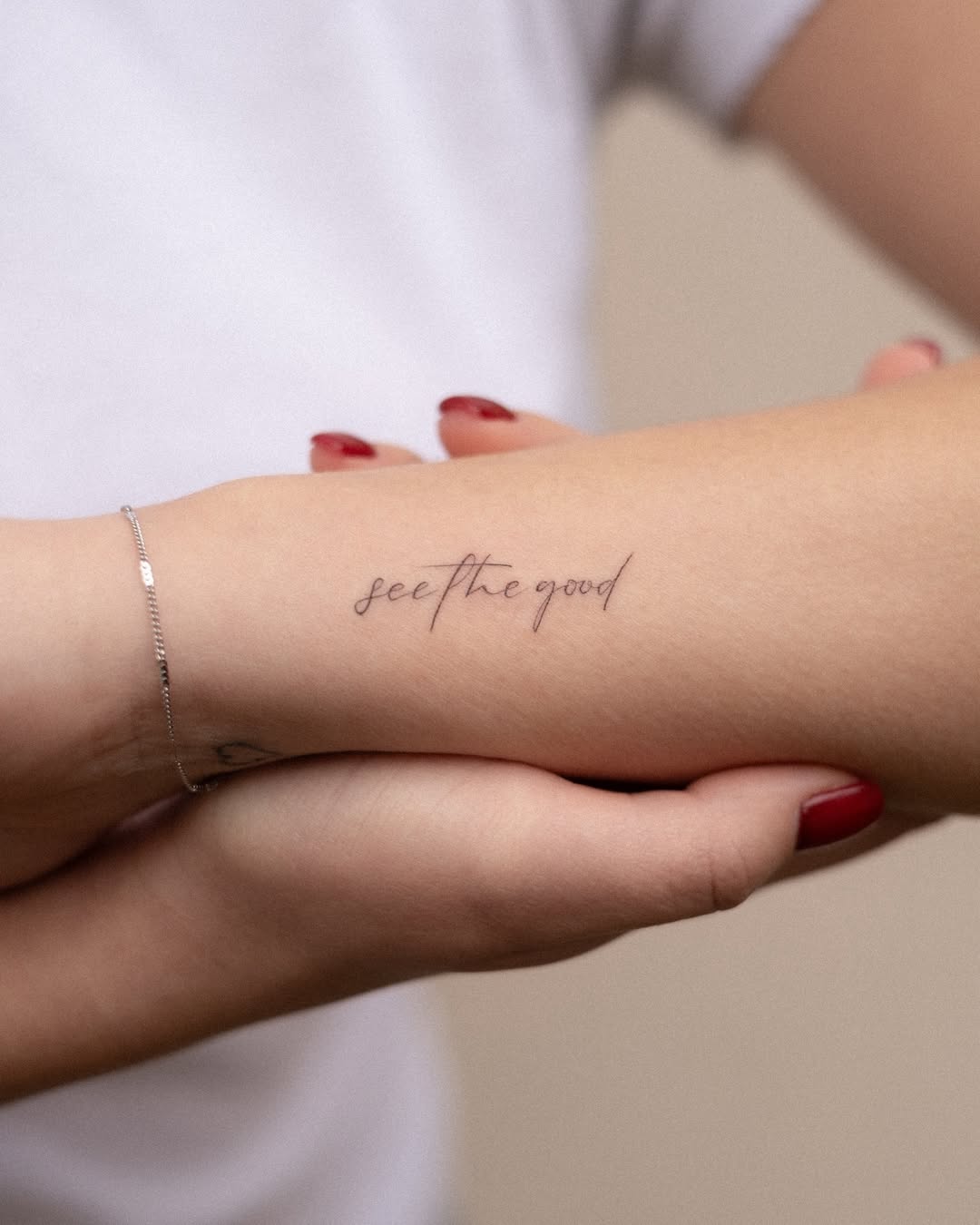 Minimalistic tattoo with an uplifting message