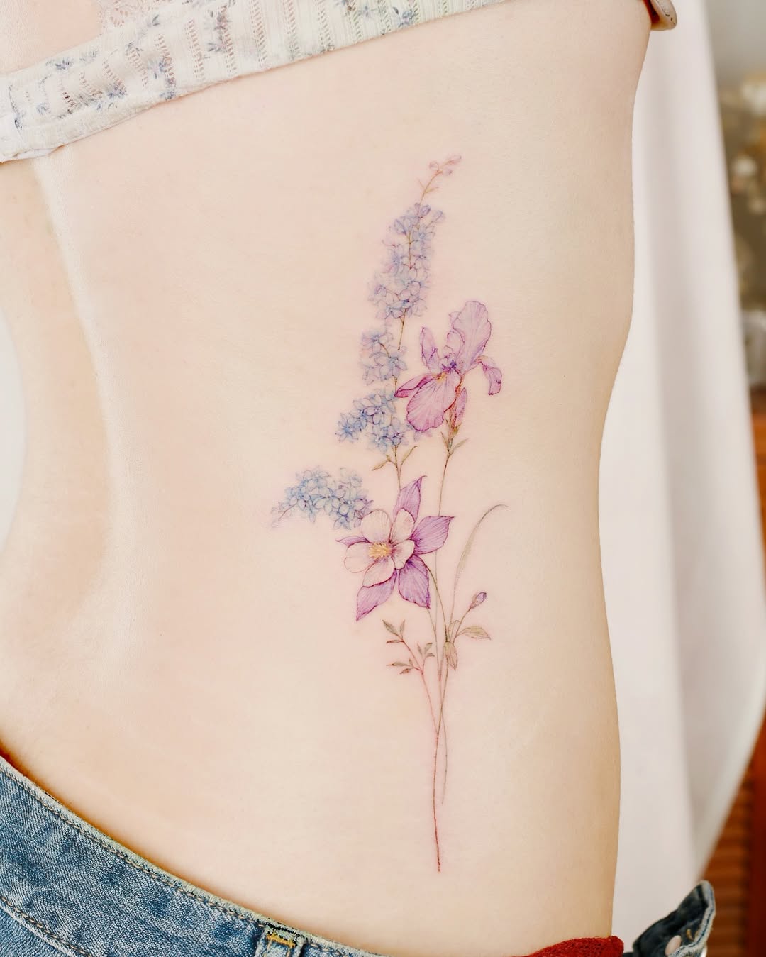 Delicate Floral Waist Tattoo Design