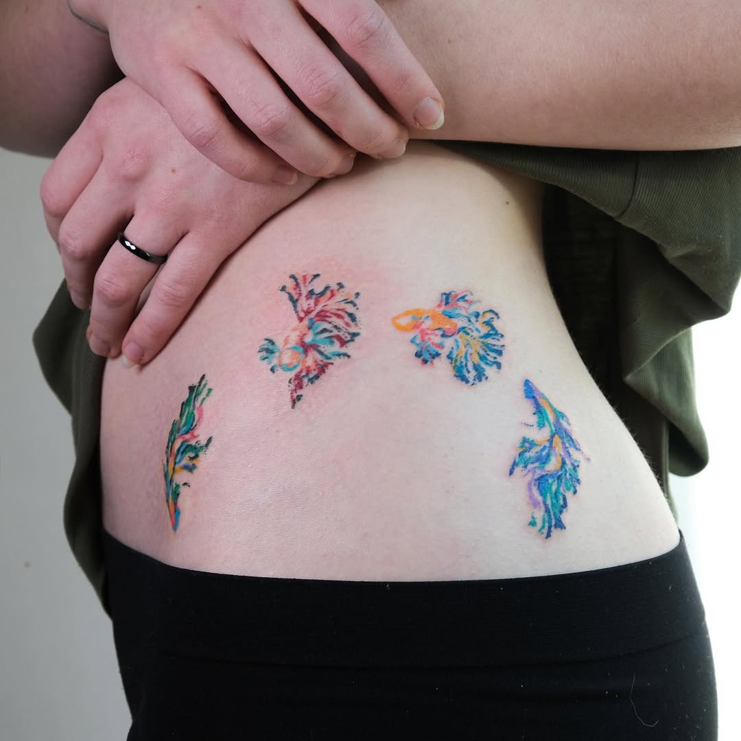 Whimsical Floral Waist Tattoos in Vibrant Colors