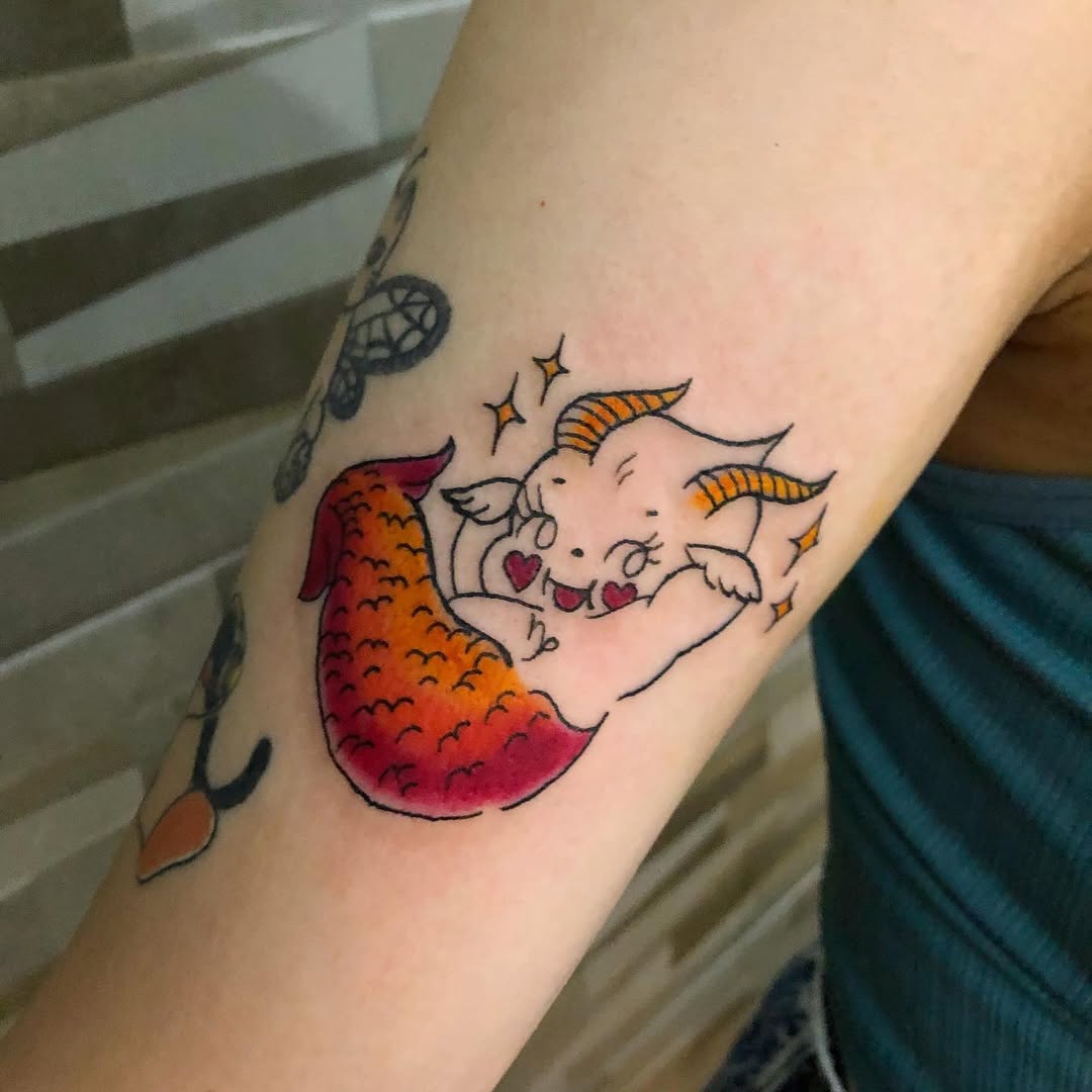 Playful Capricorn Mermaid Tattoo Design