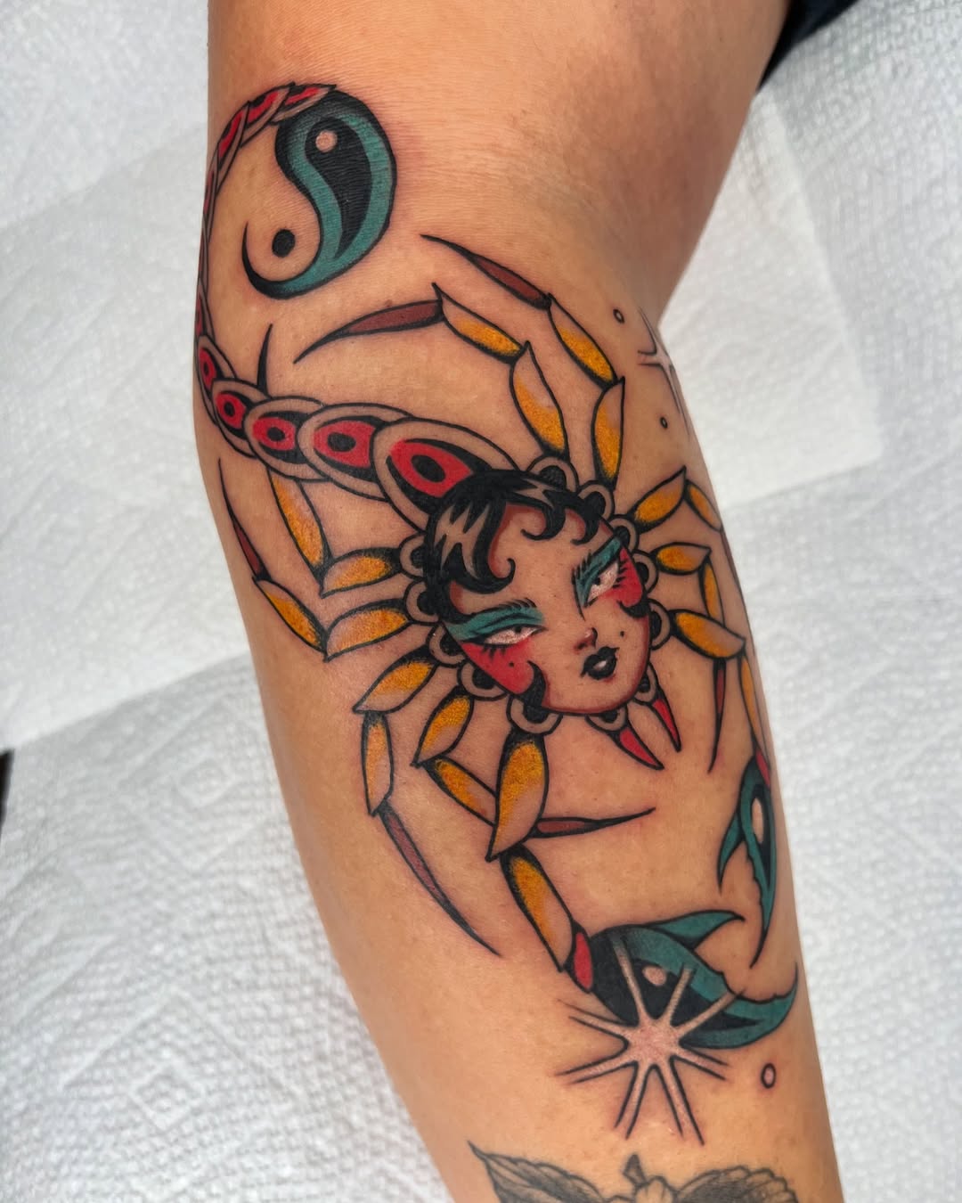 Vibrant Scorpio Tattoo with Feminine Touch