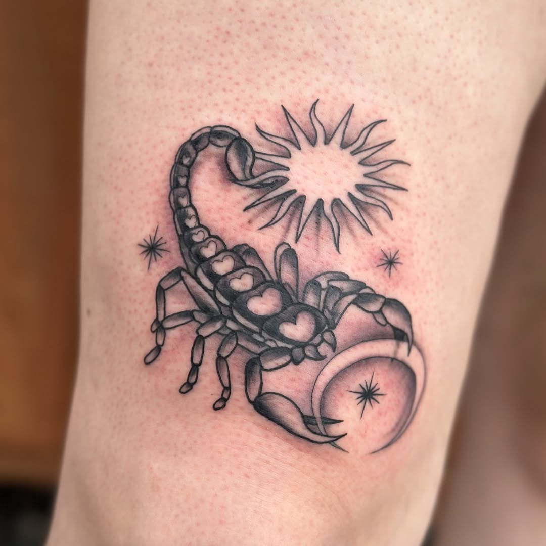 Elegant scorpio tattoo with celestial elements