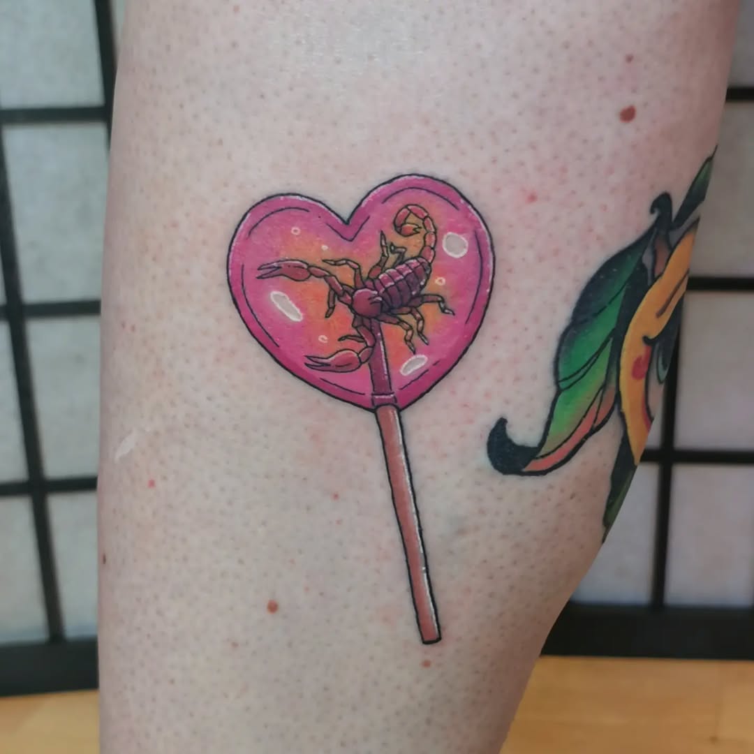 Whimsical Scorpio Tattoo with a Candy Twist