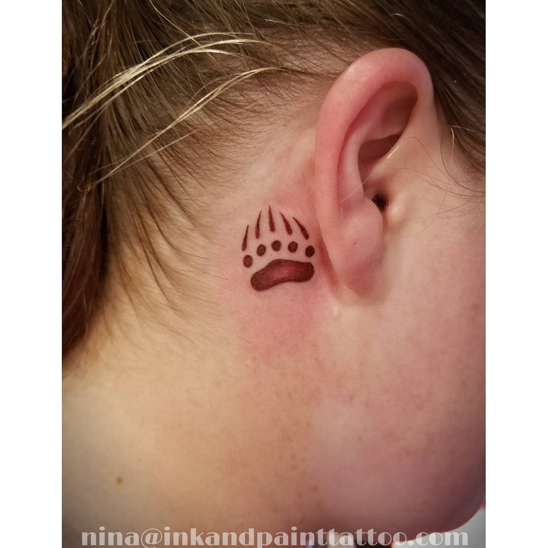 Subtle Bear Paw Tattoo Behind the Ear