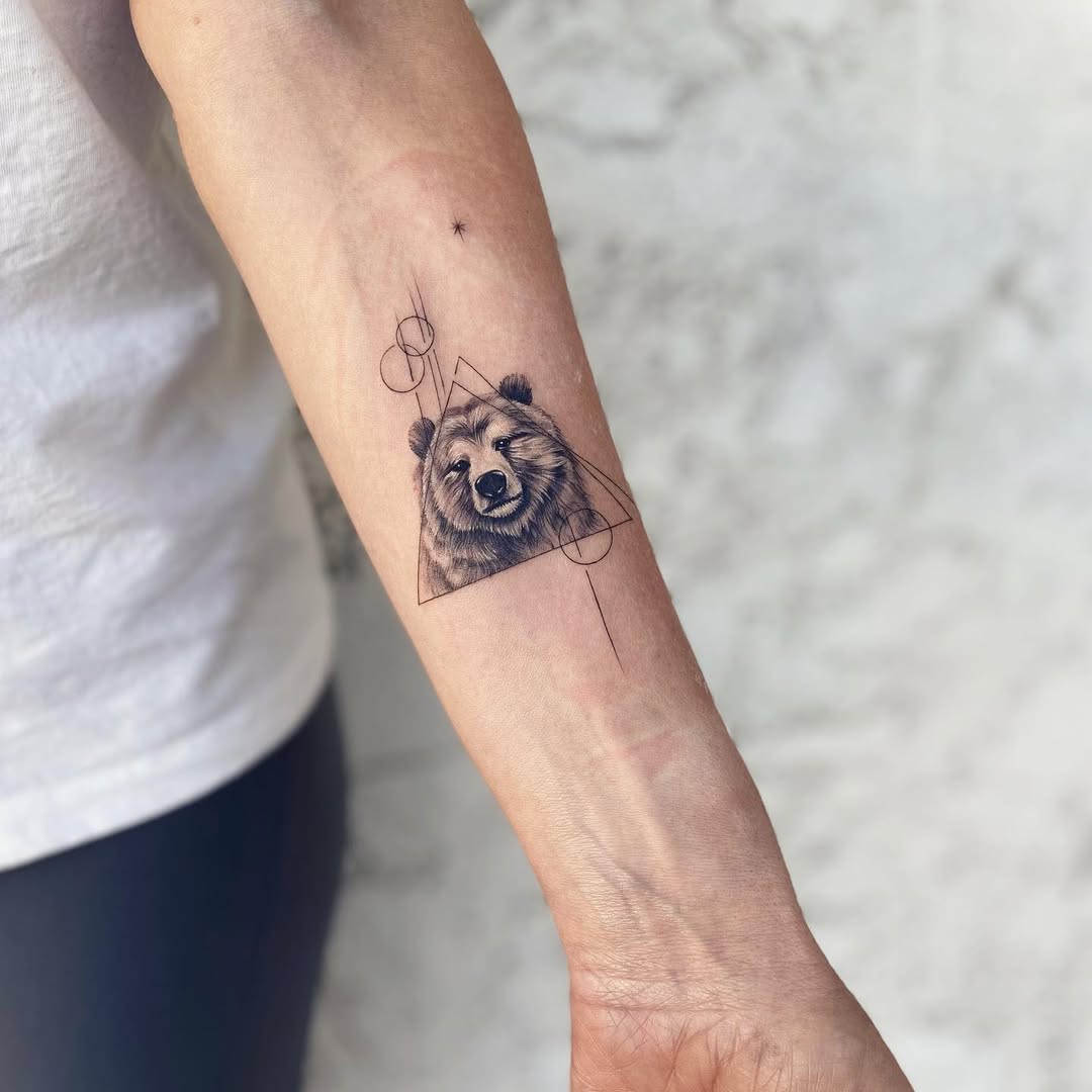 Geometric bear tattoo with intricate details