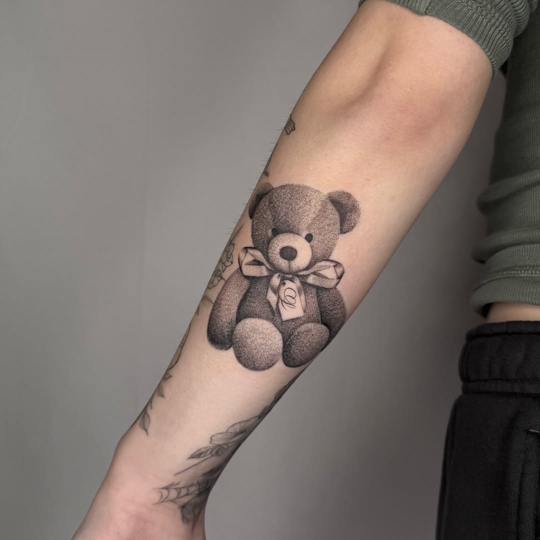 Charming bear tattoo showcasing nostalgic vibes