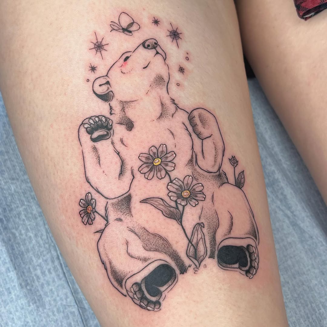 Whimsical bear surrounded by floral elements