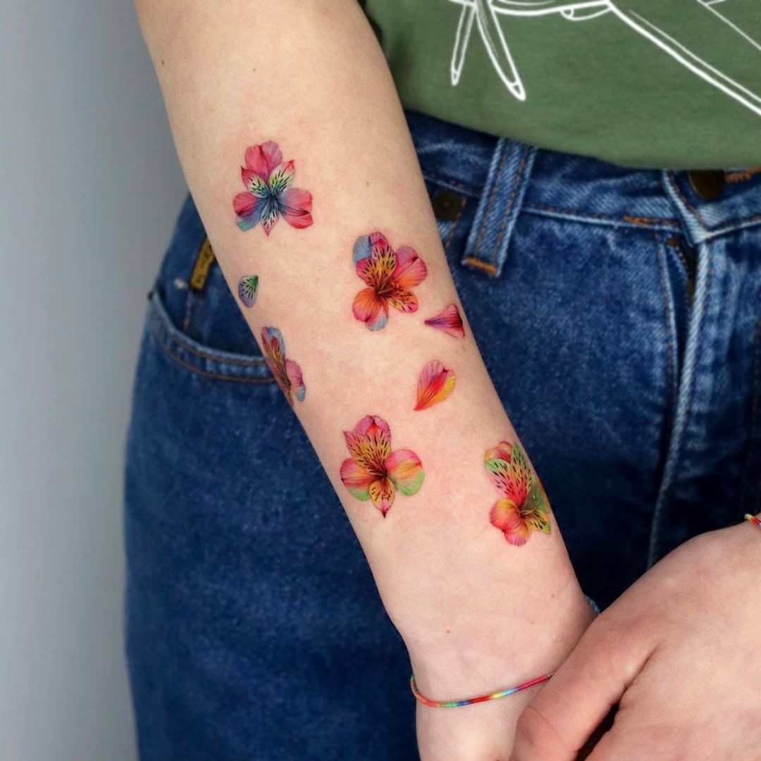 Vibrant Floral Tattoo Art on Forearm
