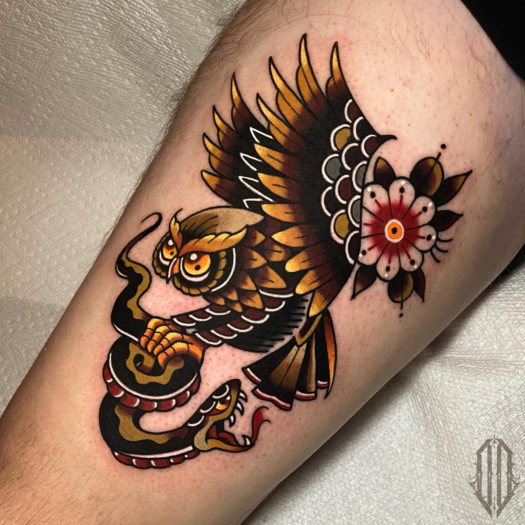 Dynamic owl and snake tattoo design