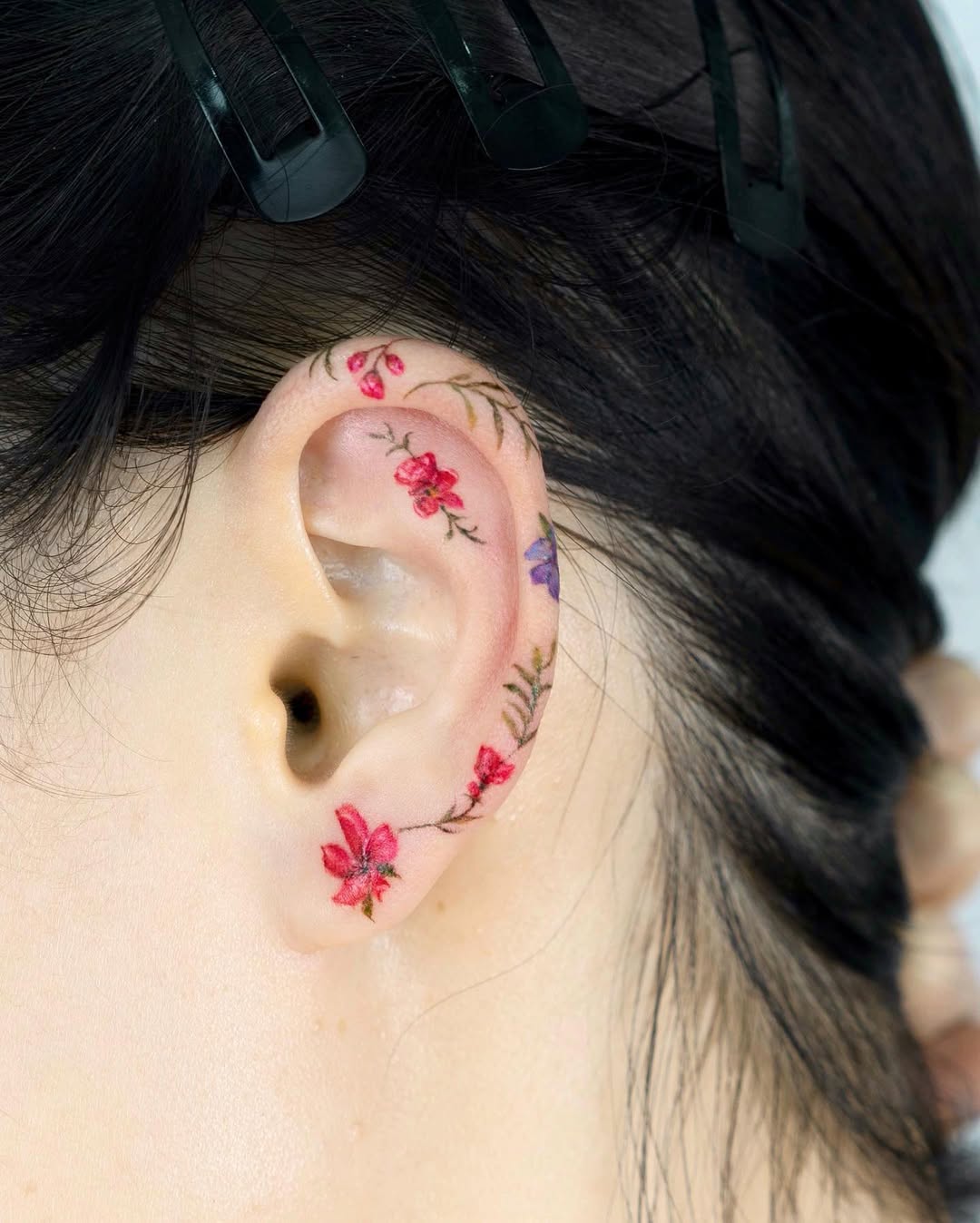 Delicate Floral Ear Tattoos for Nature Lovers