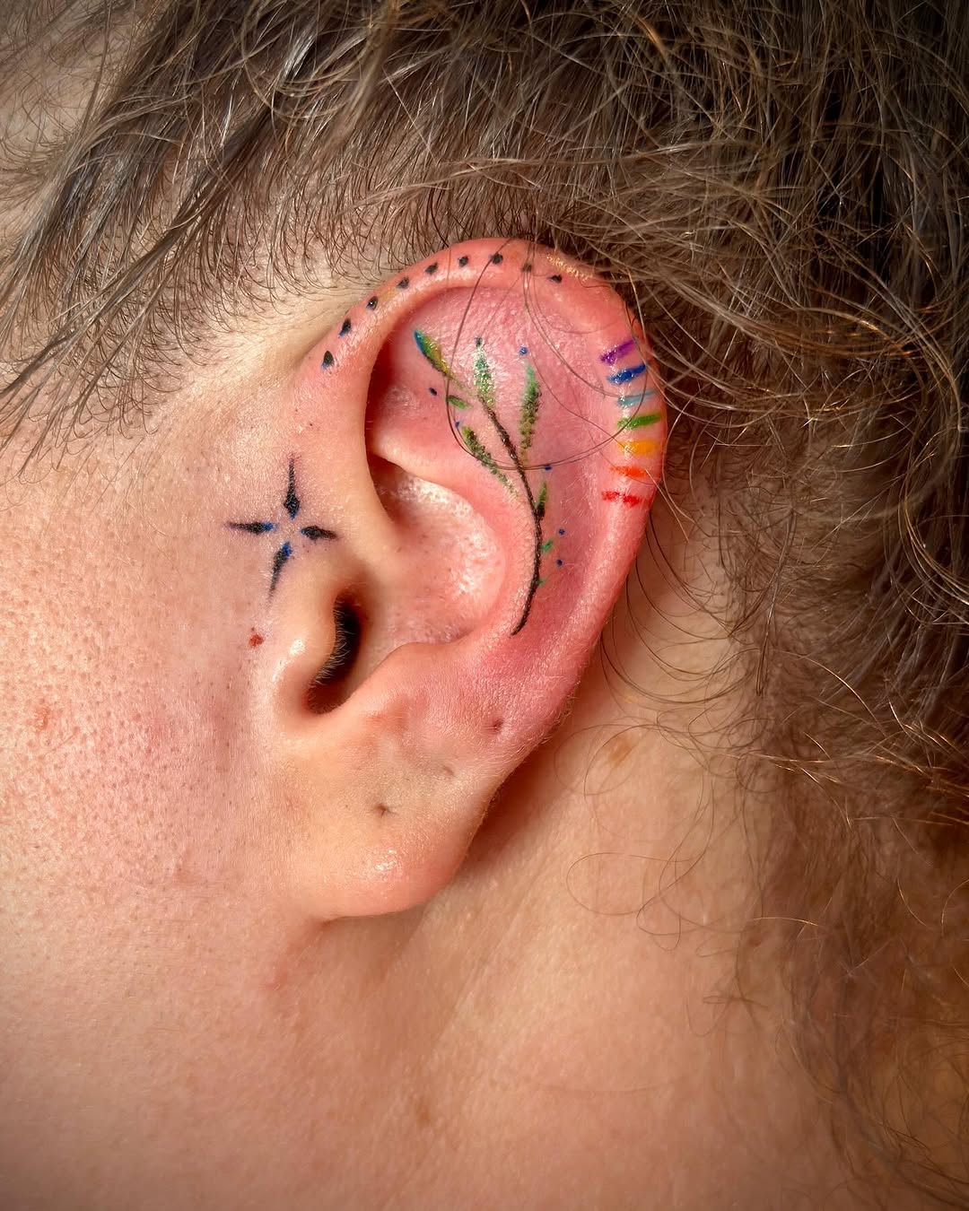 Whimsical Floral Ear Tattoo with Colors