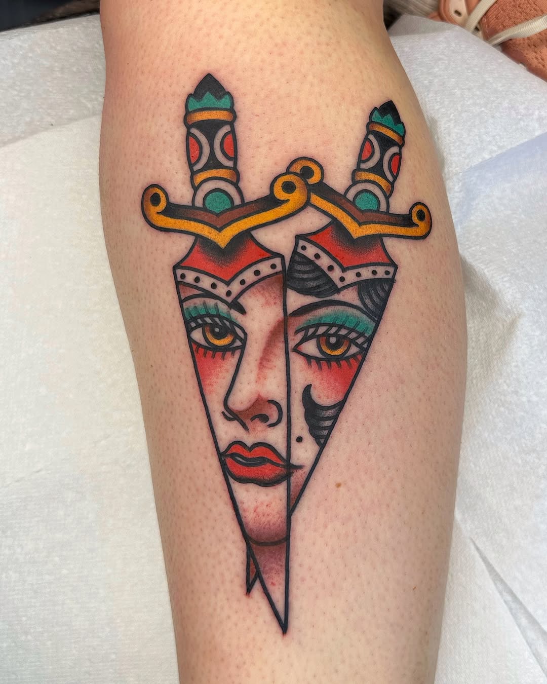 Intricate dagger tattoo with a striking design