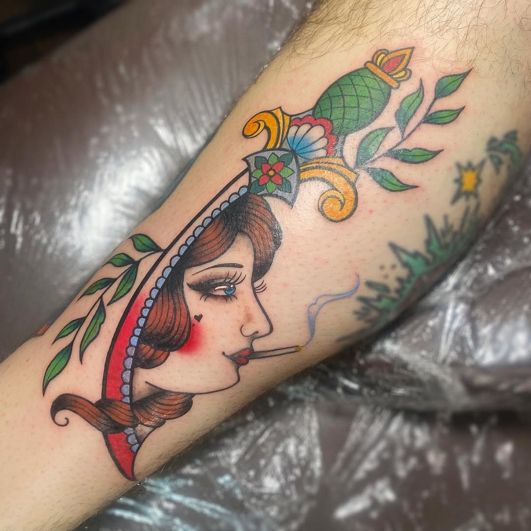 Elegant vintage dagger tattoo with a twist