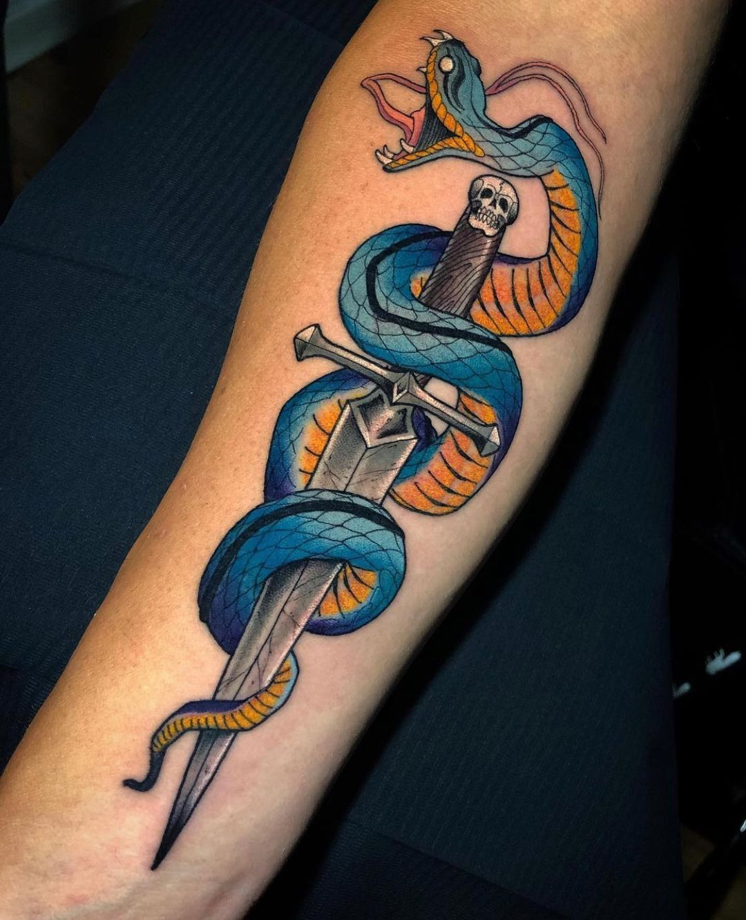 Vibrant dagger entwined with snake design
