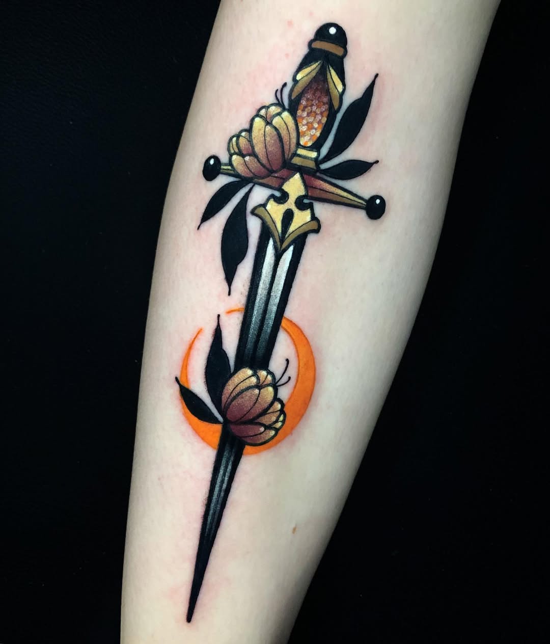 Elegant Dagger Tattoo with Floral Elements
