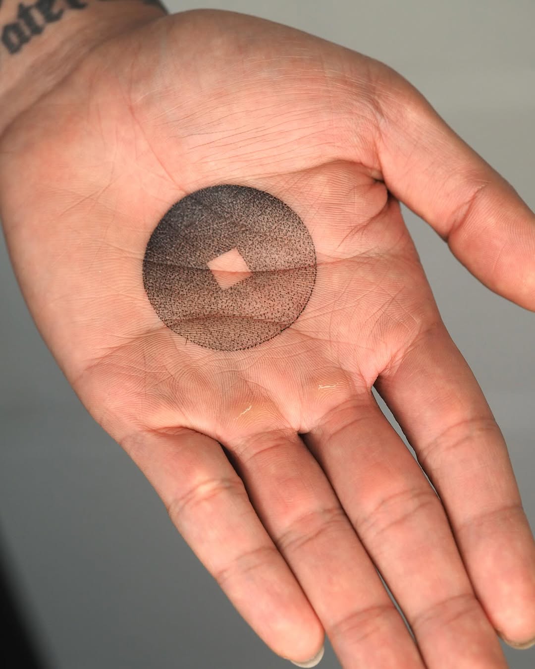 Unique geometric tattoo capturing minimalist essence