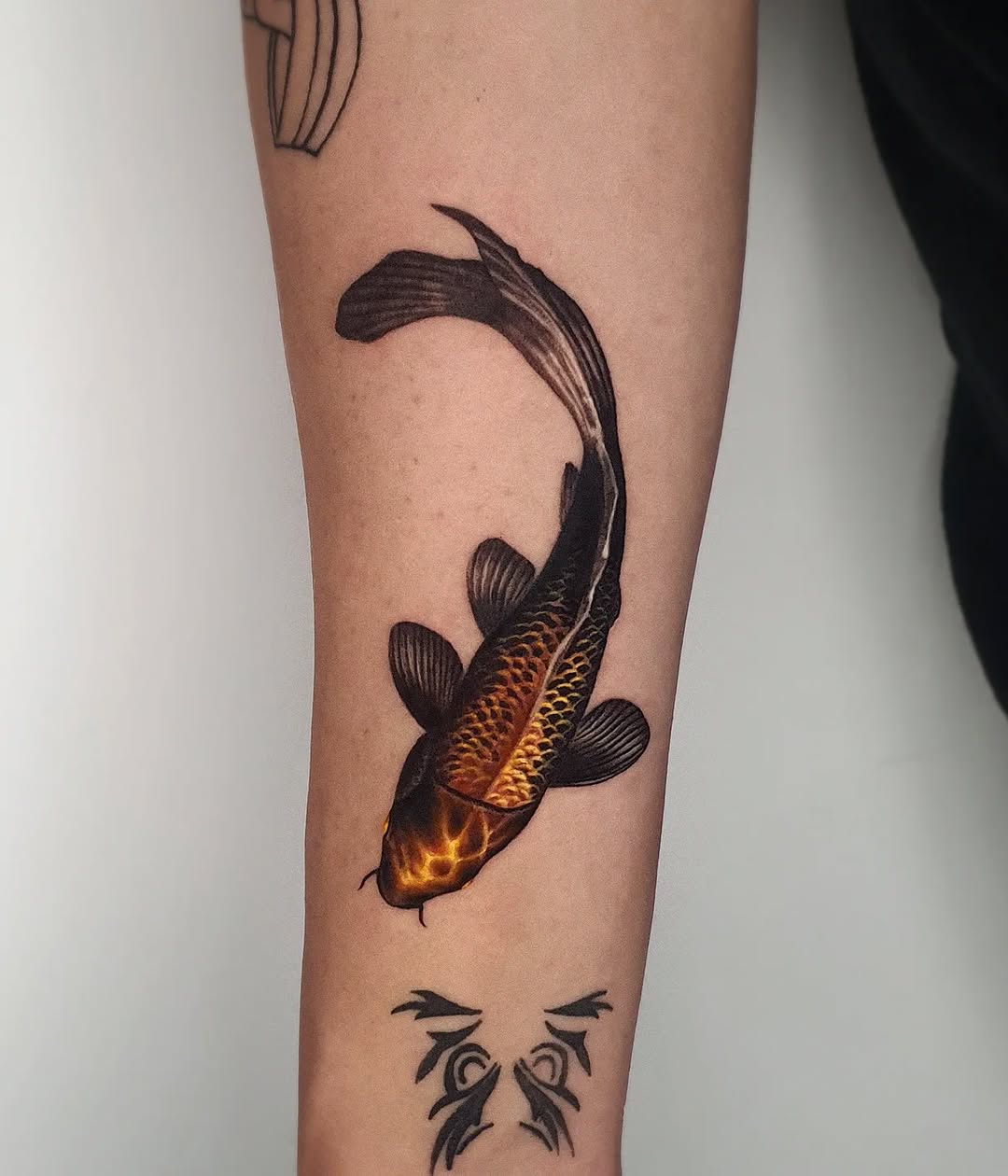 Stunning koi fish tattoo with lifelike details