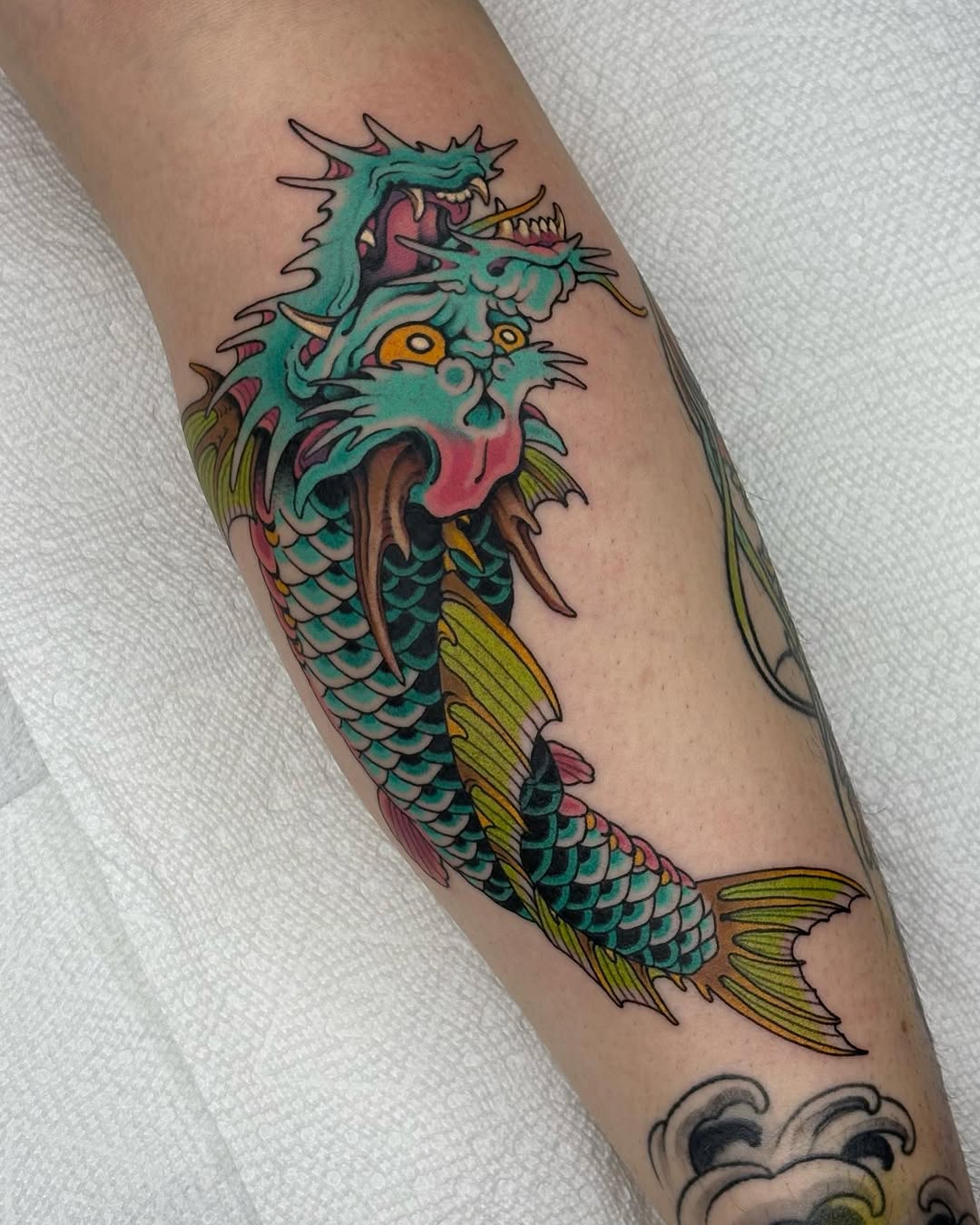 Colorful koi fish tattoo with vibrant details