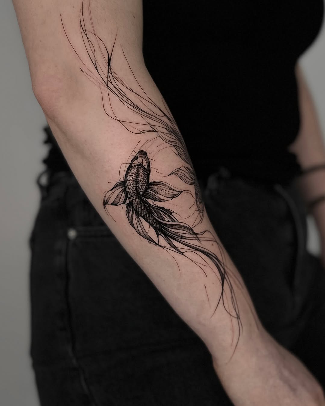Elegant black line koi fish tattoo design