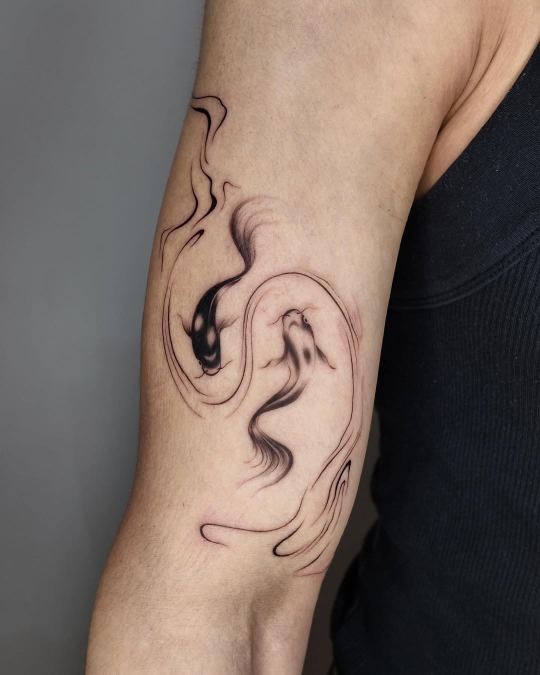 Elegant Koi Fish Tattoo with Flowing Lines