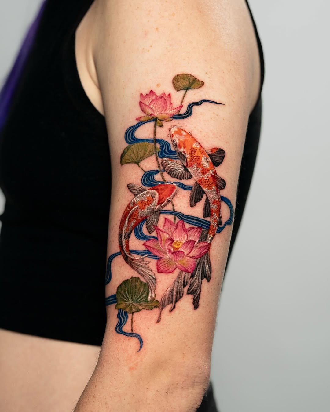 Elegant koi fish tattoo flowing with nature