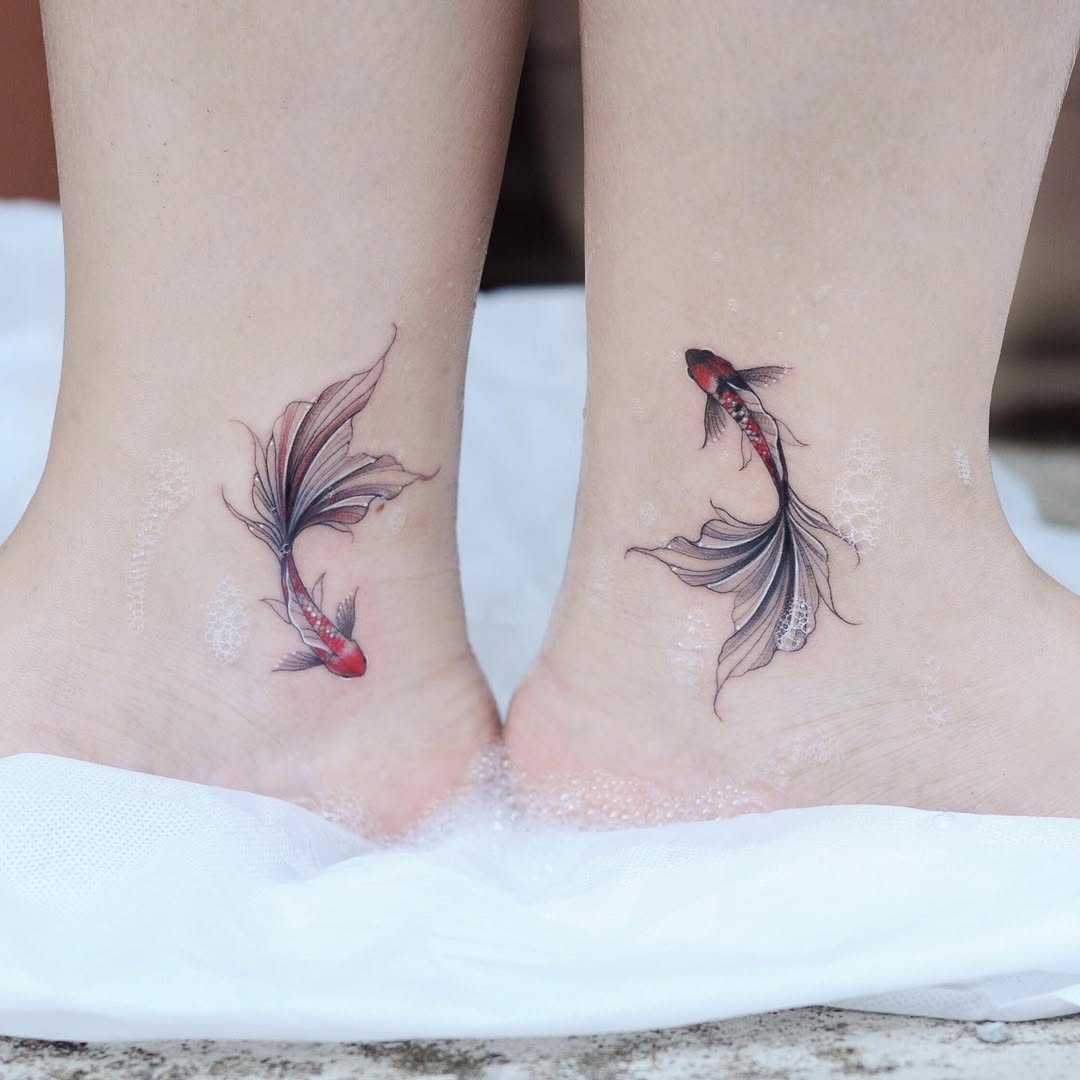 Elegant koi fish tattoos on ankles