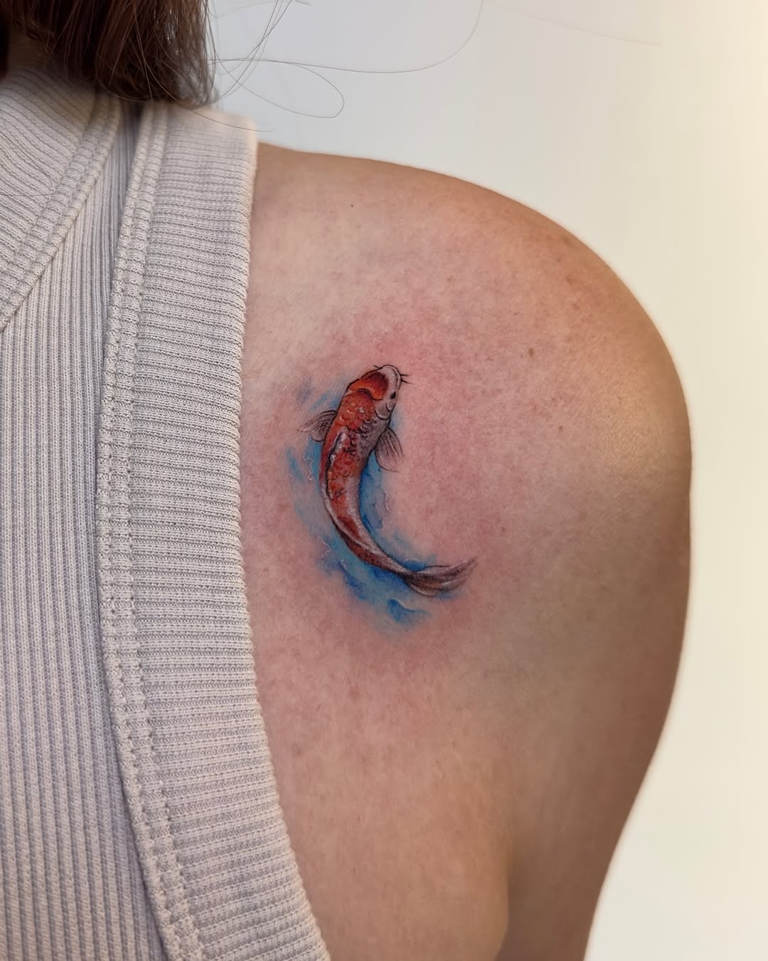 Vibrant Koi Fish Tattoo on Shoulder