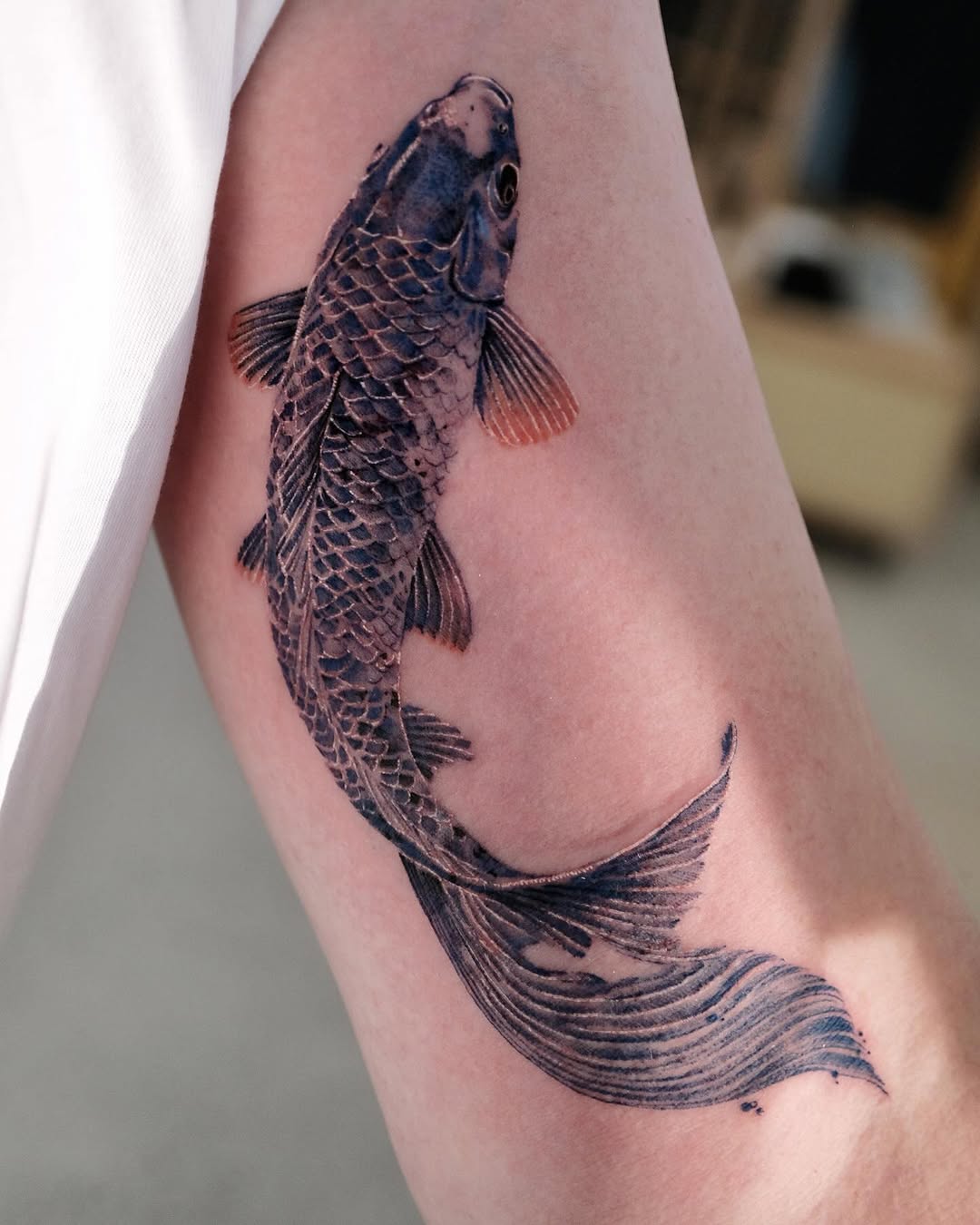 Stunning tattoo showcasing intricate koi fish details