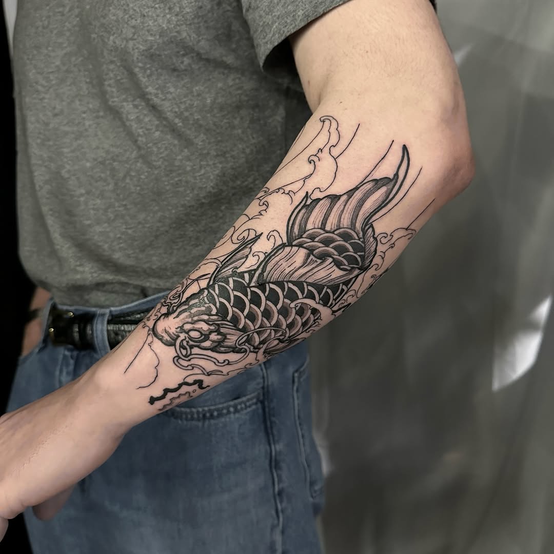 Dynamic koi fish tattoo showcasing bold lines