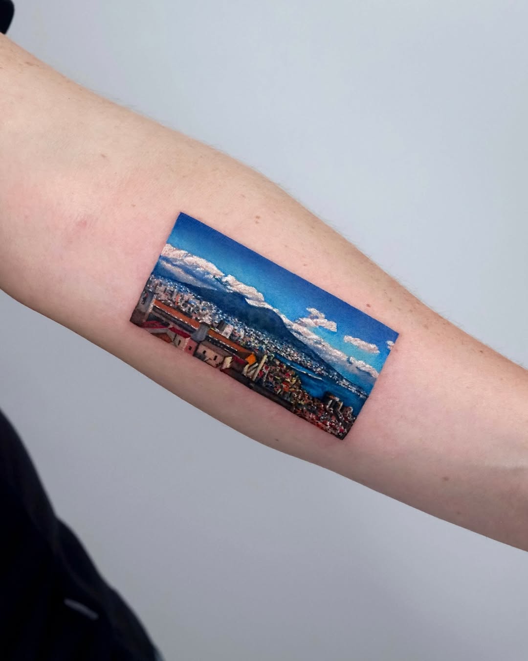 Vibrant landscape tattoo showcasing majestic scenery