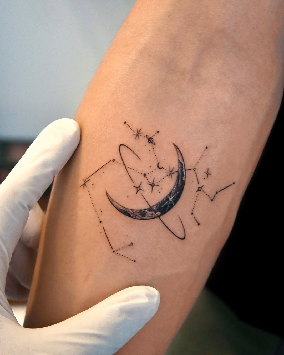 Elegant Sagittarius tattoo with cosmic elements